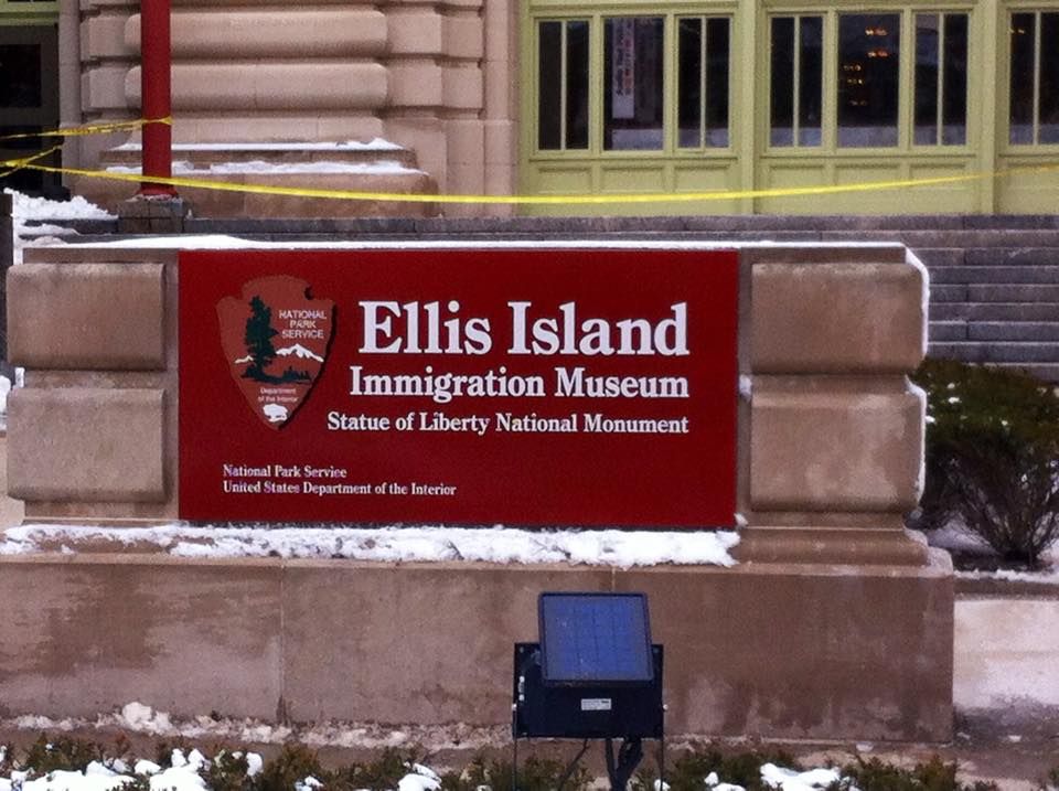 Sign marking the entrance to Ellis Island