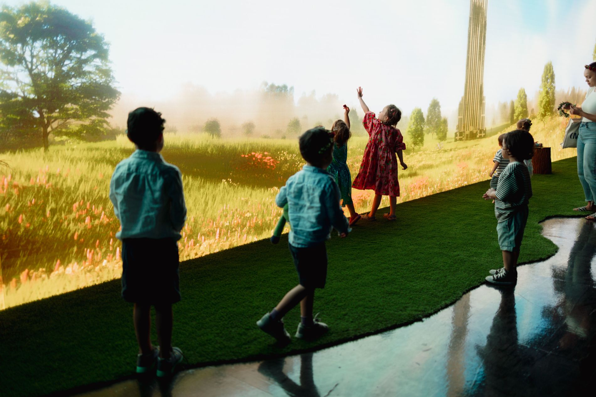 Children enjoying the BLOOM exhibition in New York