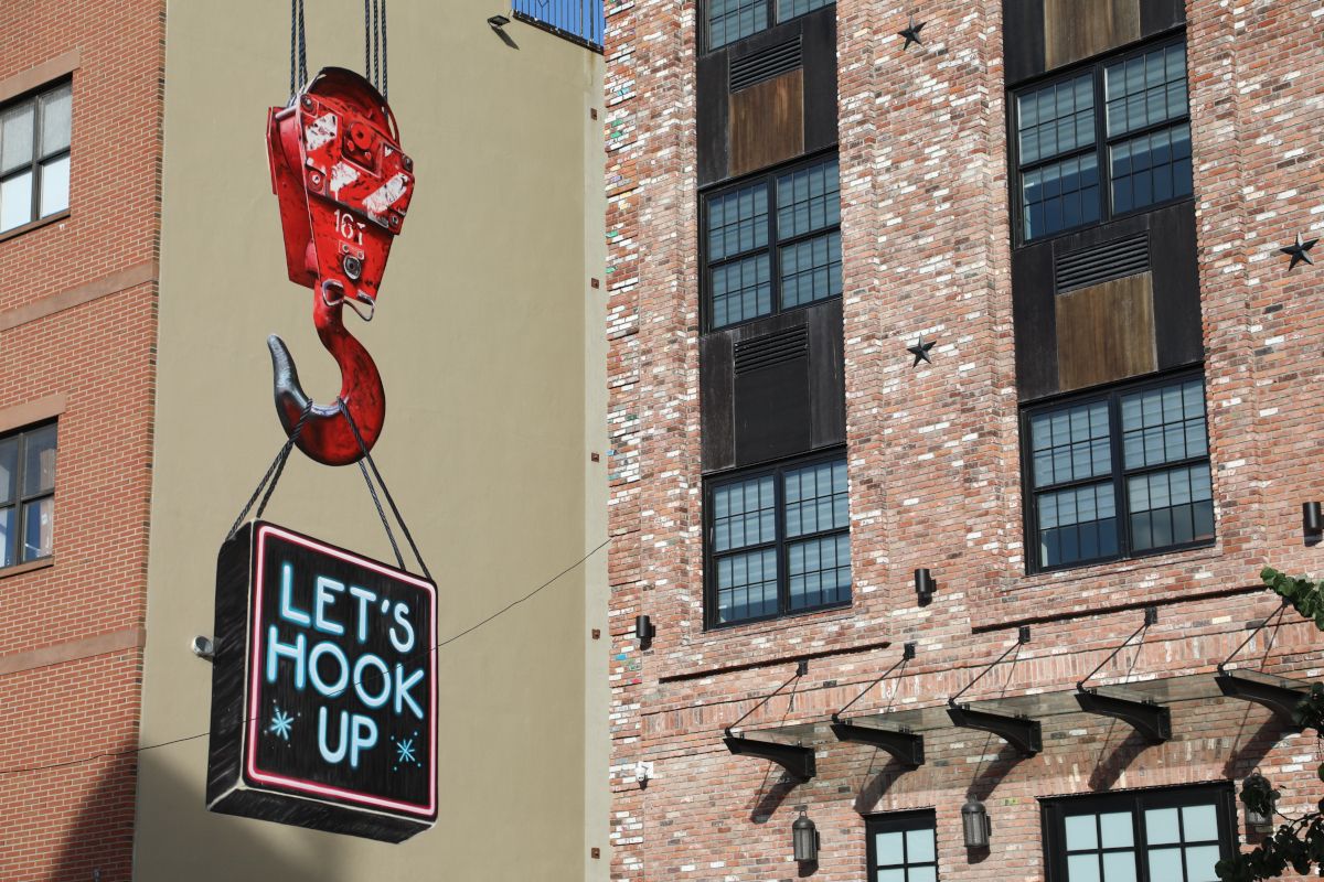 Mural of a red hook painted on a wall in Red Hook neighborhood