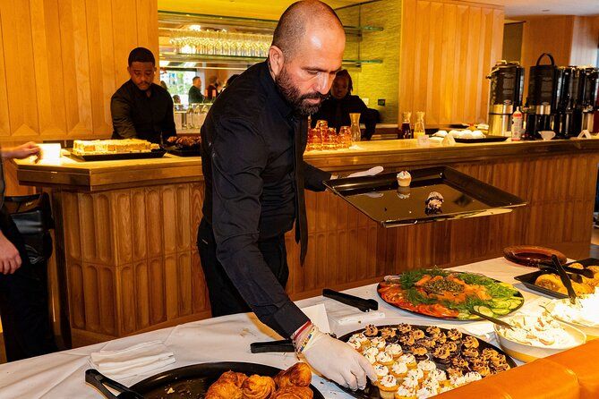 server presenting dishes during the New Year's Eve gala at Acadia restaurant in New York