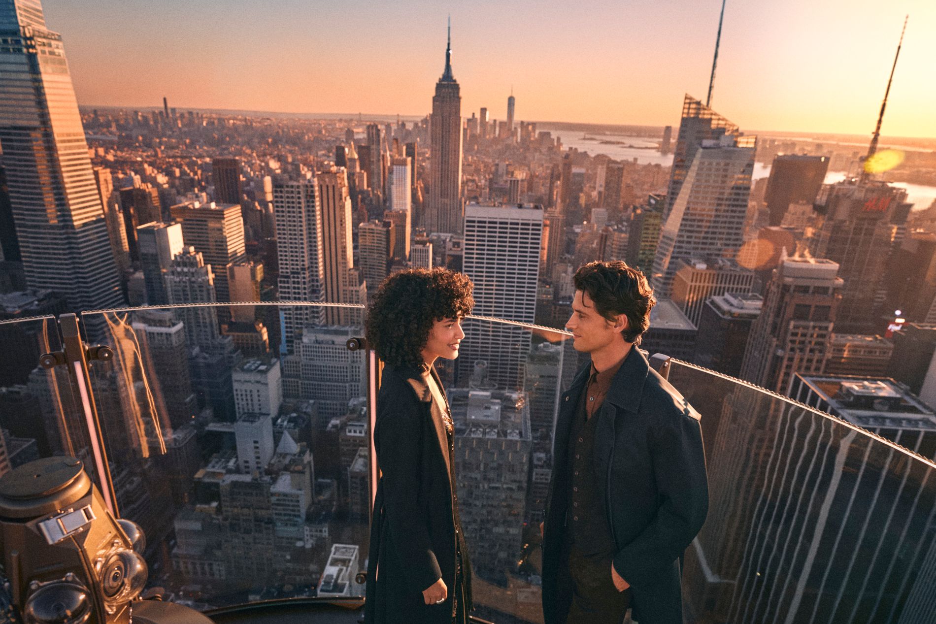 Couple aboard the SkyLift attraction at Top of the Rock in New York