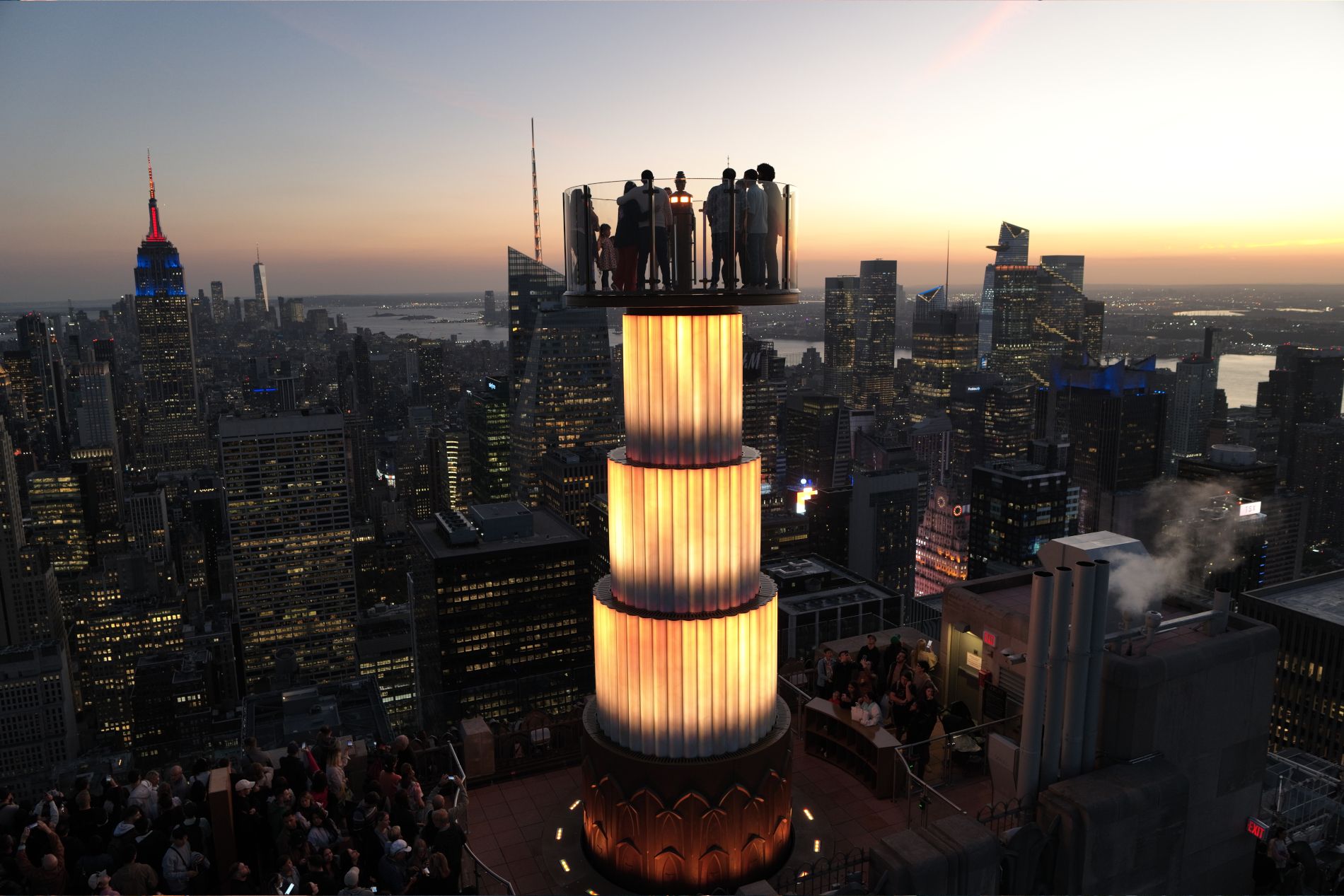 Sunset over the SkyLift attraction at Top of the Rock in New York